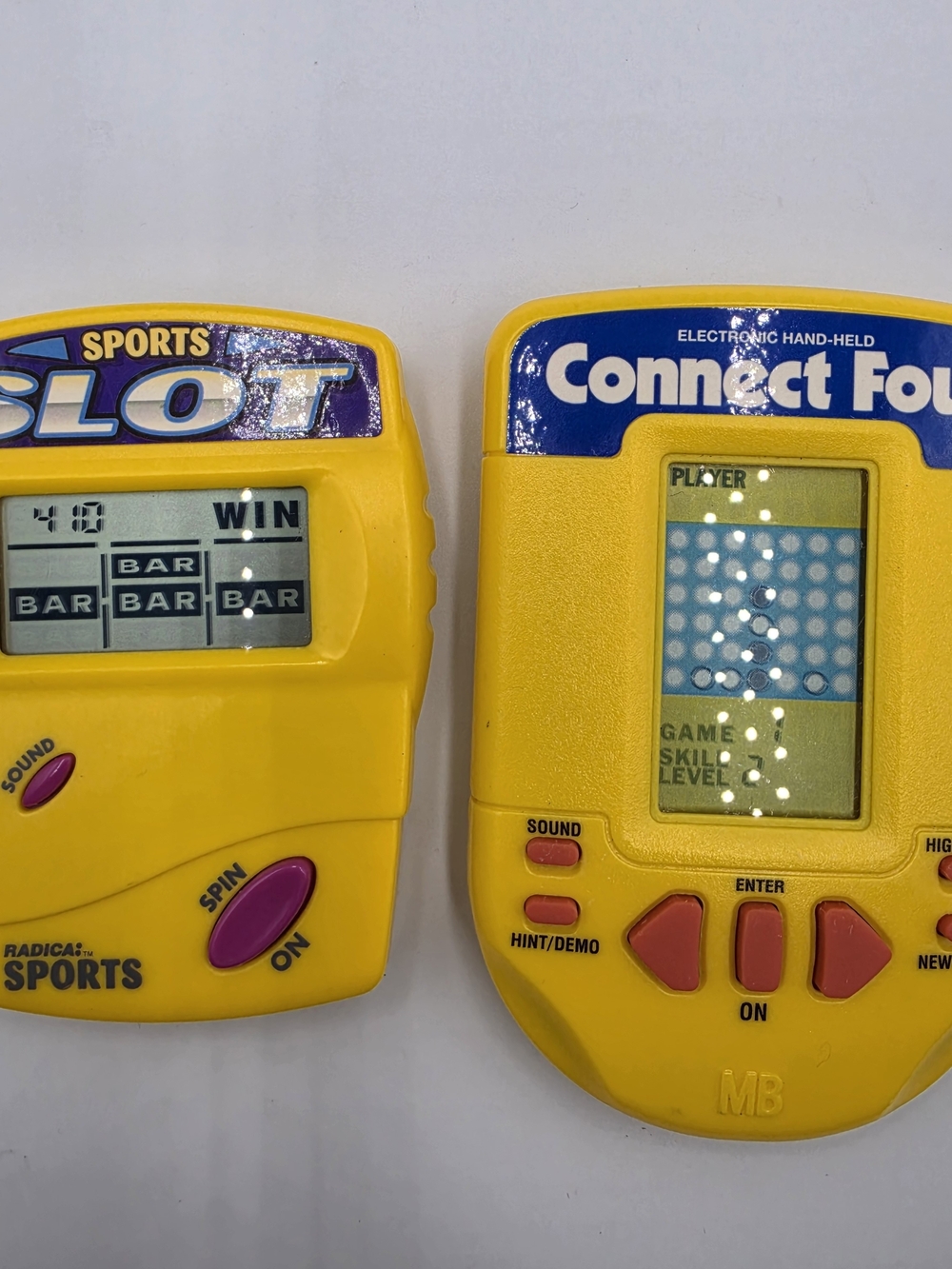 Vintage Handheld Electronic Games Lot–1995 MB Connect Four & Radica Sports Slot